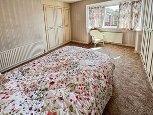 Bedroom One- click for photo gallery